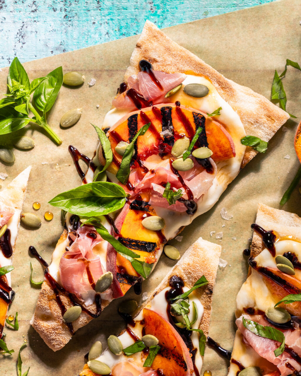 Grilled Peach & Prosciutto Flatbread. Juicy, grilled summer peaches are the star of this perfect party appetizer! Shortcut the dough with a frozen, store-bought version to make this recipe a breeze.