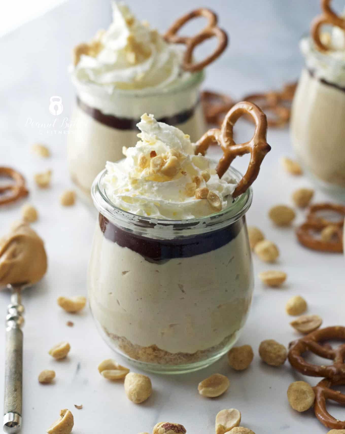Peanut Butter Protein Cheesecake Cups with Pretzel Crust Peanut
