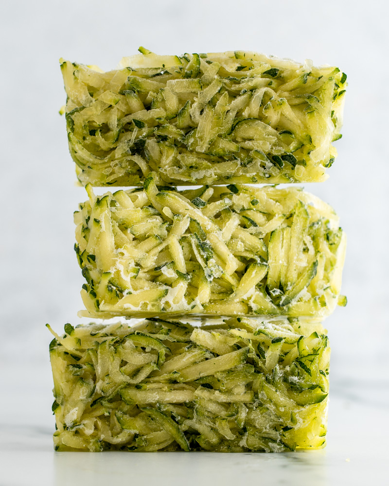 https://www.peanutbutterandfitness.com/wp-content/uploads/2022/02/Frozen-Shredded-Zucchini-1.jpg