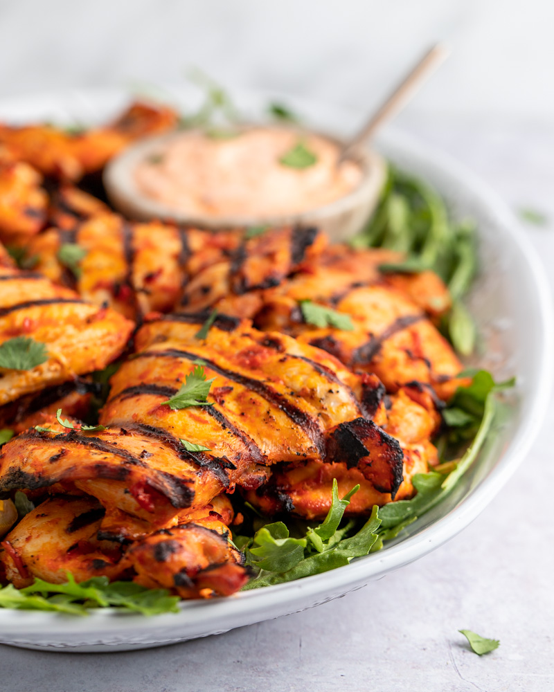 Harissa Grilled Chicken Thighs with Yogurt Dip