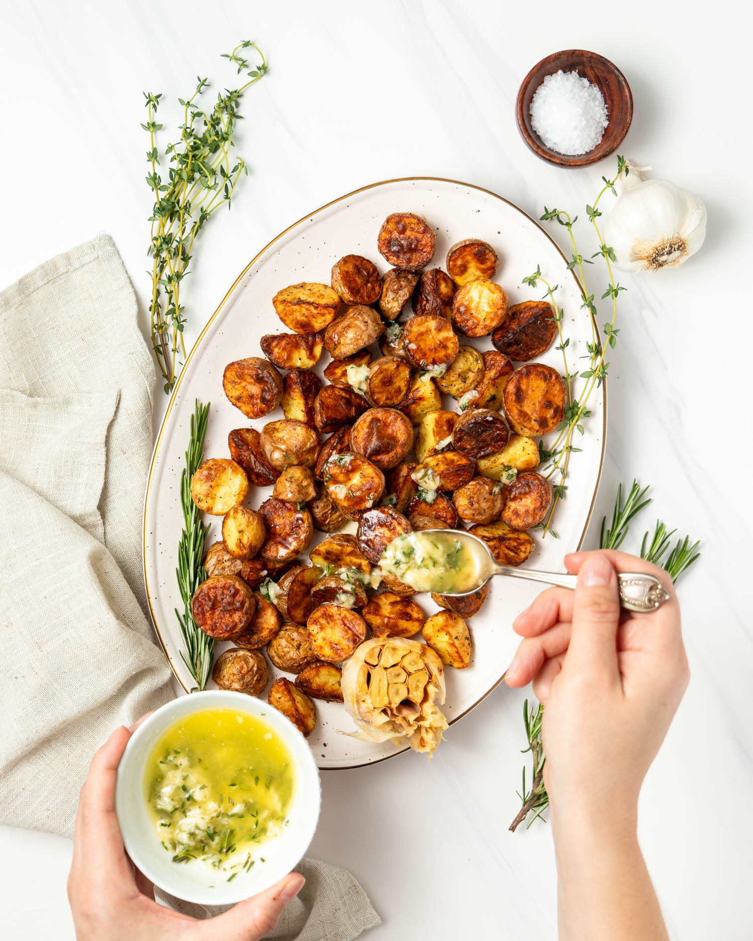 Air Fryer Potatoes with Garlic Herb Butter