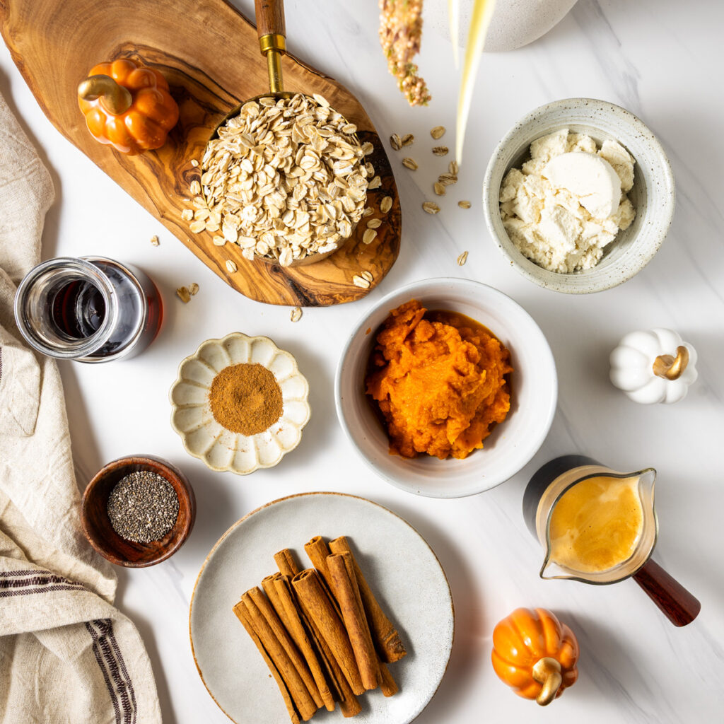 PSL Protein Overnight Oats ingredients. Bring the flavors of a classic Pumpkin Spice Latte to your high protein make-ahead breakfast, complete with the caffeine boost! These creamy overnight oats deliver 23 grams of protein per serving.